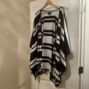 Leather trimmed poncho